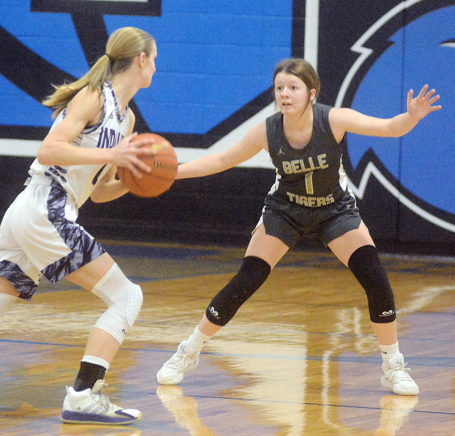 Victoria Busch (right) guards Pacific’s Trinity Brandhorst during Saturday afternoon’s third-place game at the Battle in Bourbon Girls Basketball Tournament in which Belle suffered a 33-28 setback.